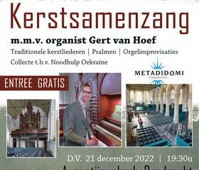 Massale kerstsamenzang met organist Gert van Hoef
